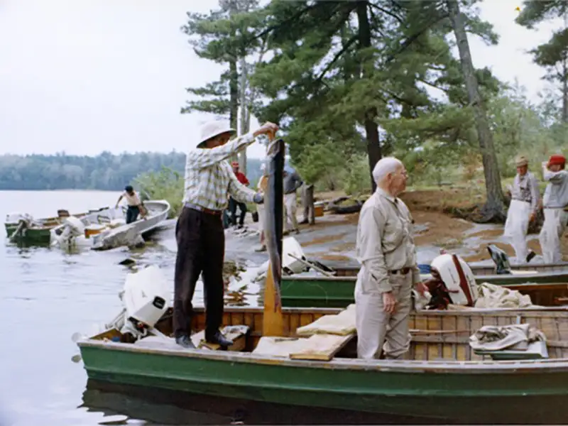 Vintage Fishing Boats at the Lodge Vintage fishing boats returning to the dock at Grassy Narrows Lodge on Lake of the Woods.