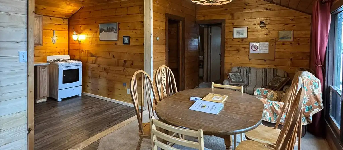 Cabin kitchen and dining area at Grassy Narrows Lodge