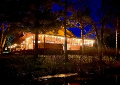 Grassy Narrows Lodge illuminated at night