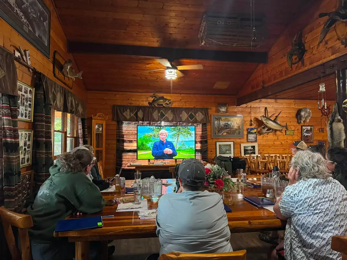 Guests gathering inside Grassy Narrows Lodge