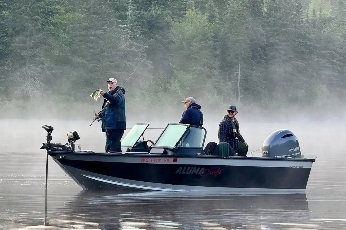 Anglers fishing from a boat on Lake of the Woods near Grassy Narrows Lodge